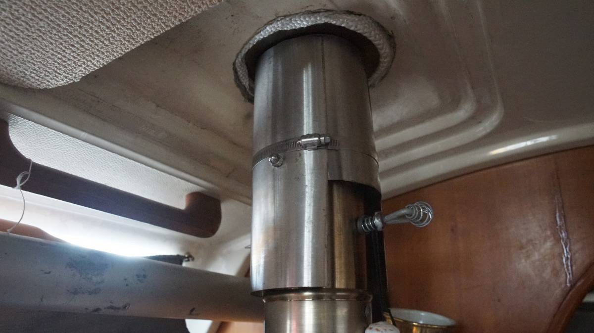 outer pipe shield and rope gasket visible