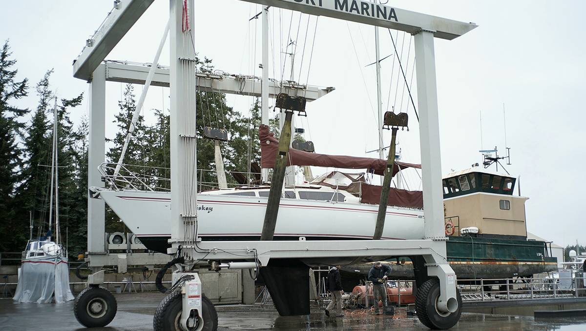 pino, formerly irish whiskey, sitting in the slings of a travel lift at wesport marina