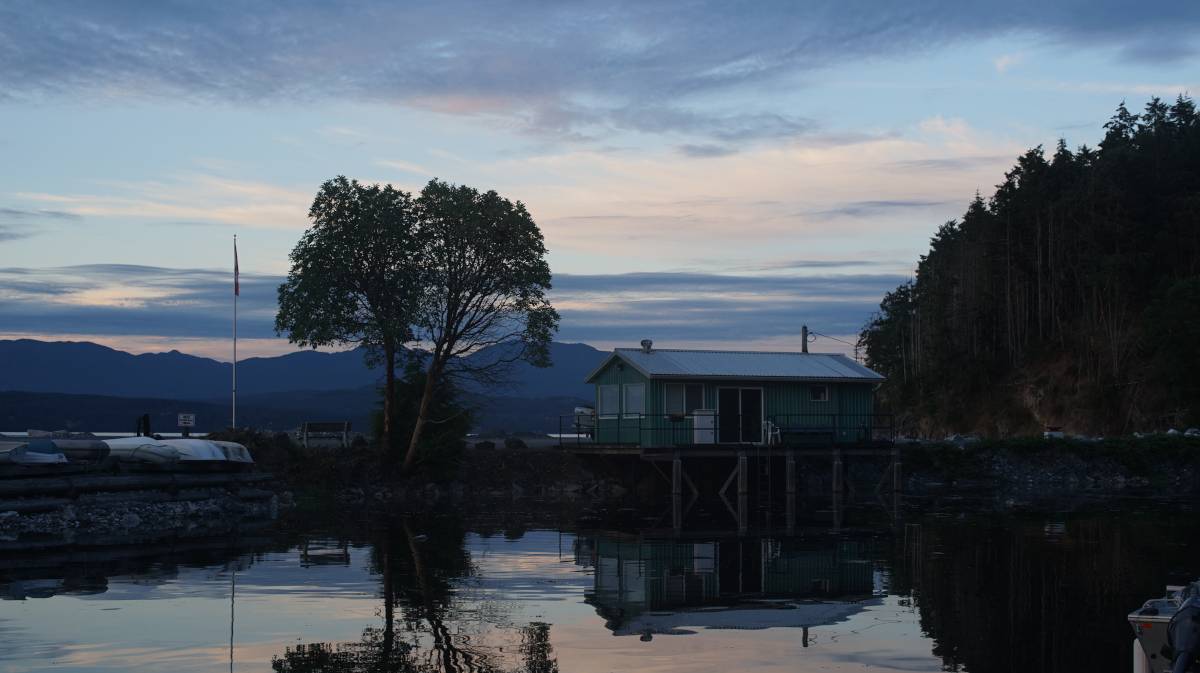 a view of the breakwater with the wharfinger cabin on stilts