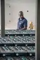 Christopher Kinyua, Maintenance Supervisor at Kilaguni Serena Safari Lodge, checks on some of the battery banks installed as part of the solar hybrid power solution at the lodge.