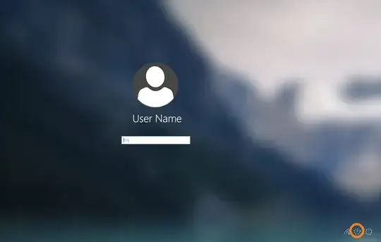 Windows 10 login screen, with accessibility button highlighted in an orange circle.