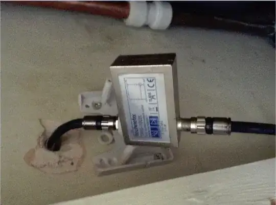 Silver box joining black cables