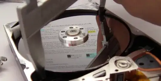 Insert platter by holding edges using rubber edged tool.