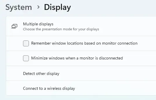 Screenshot of Display Settings panel showing "Multiple displays" options