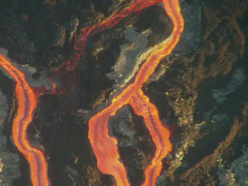 Figure 8.11: In effusive eruptions, lava flows more readily, producing rivers of molten rock.