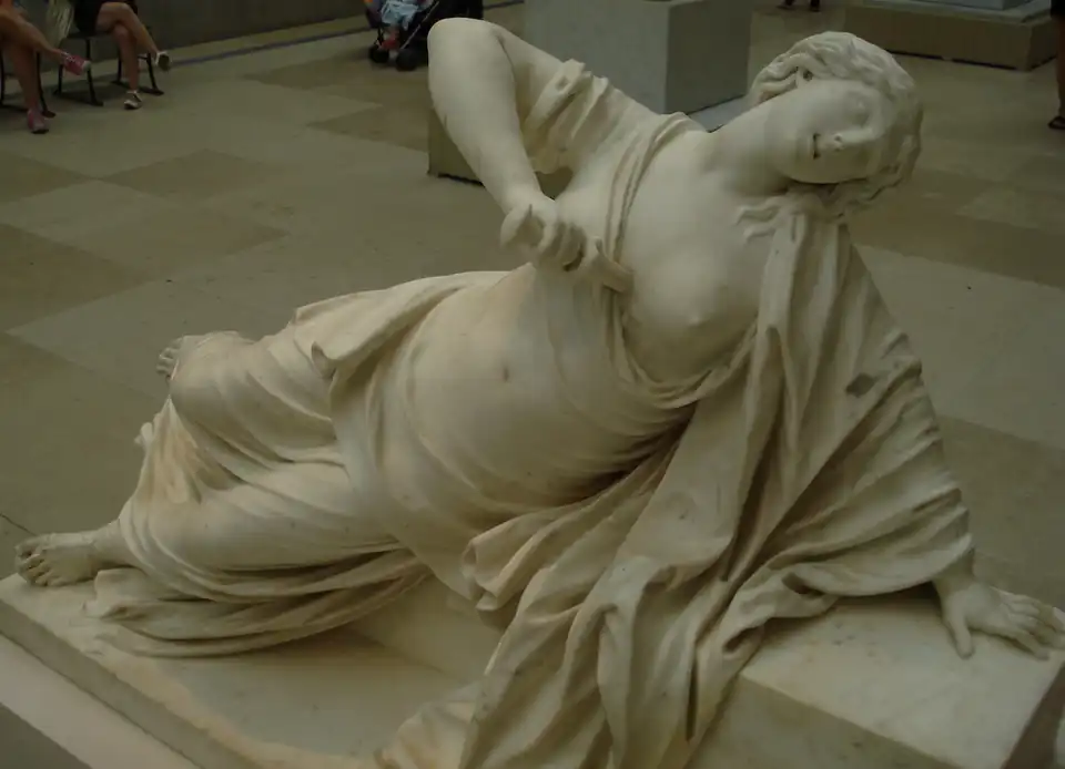 Marble statue of Lucretia committing suicide after her rape, by 18th century French sculptor Philippe Bertrand. In the collection of the Metropolitan Museum of Art.