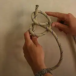 Make the second overhand loop