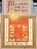 sunclock on the southern exterior wall