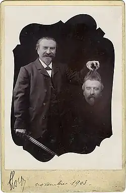 Unknown photographer (France). A bearded man holds his severed head in his hand, 1899.