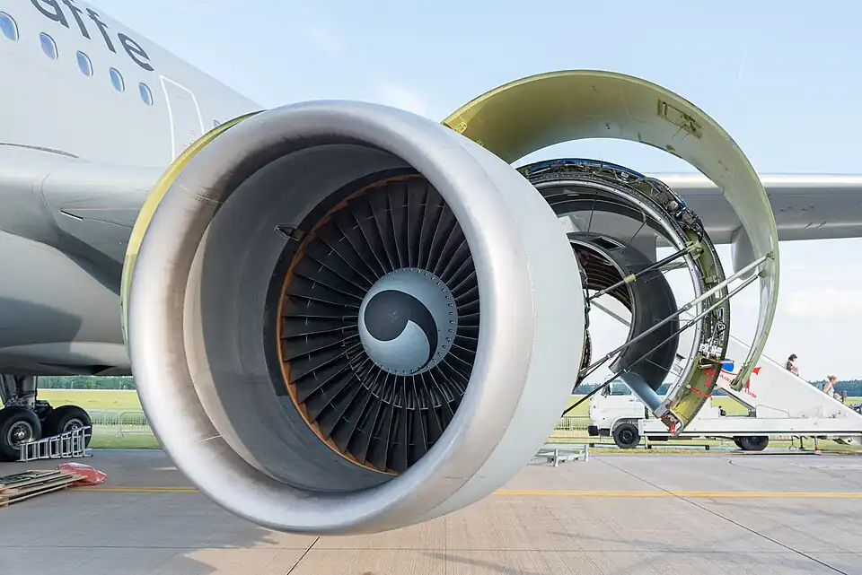 Turbofan (CF-6) inlet and fan. The core flow area, 1/6th, is visible through the fan. A comparison of how effective the subsonic inlet is at compressing air compared with the fan is given by inlet ram and fan temperature rises for a CFM56 of about 30 and 40 °F at 0.85 Mn cruise.[3] Temperature rise is connected to pressure rise by the losses incurred in the way the compression is achieved and all three are visually apparent on a T~s diagram.