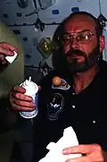 Loren W. Acton with Pepsi can