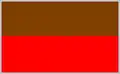 A two toned rectangular military identification patch. The two colours are Brown over red