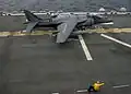 An USMC AV-8B Harrier of VMA-311 aboard USS America on 22 February 2015