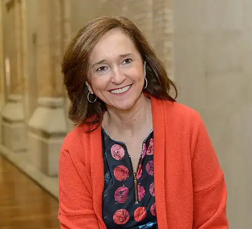 Image 17 Ana Santos Aramburo Photograph credit: Biblioteca Nacional de España Ana Santos Aramburo (born 1957) has been the director of the National Library of Spain since February 2013. Having received a degree in geography and history from the University of Zaragoza in Spain, she has spent much of her career working at the Complutense University of Madrid, first at the library of the Faculty of Economics and Business Sciences, and later serving as deputy director of the university library. Later she served as Director of the Historical Library Marquis of Valdecilla, General Director of Libraries and Archives of the City of Madrid, and Director of Cultural Action at the National Library. This photograph of Santos shows her at the headquarters of the National Library of Spain in Madrid. More selected pictures