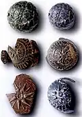 Ancient megarian cups depicting the sixteen-rayed Macedonian sunburst (3rd-2nd centuries BC) found in Ohrid, North Macedonia