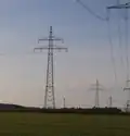 110 kV-line with two garland-like communication cables one on the ground conductor and one on an auxiliary rope
