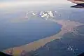 The southern part of Mutsu Bay as seen from the air over the Tsugaru Peninsula. Aomori Bay is in the center of the photograph with Noheji Bay in the top left corner.