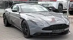 Front three-quarters view of a grey coupe