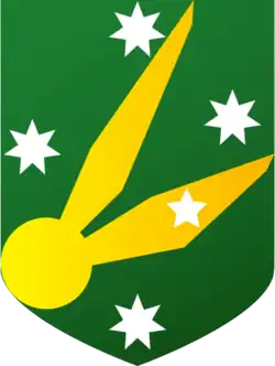 A golden snitch on a background of a green shield with four white seven-pointed and one smaller white five-pointed star arranged in the shape of the Southern Cross