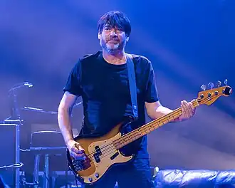 James performing with Blur in 2023