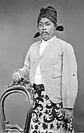 Man wearing a tied version of blangkon