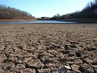 A dry lakebed in California, which is experiencing its worst megadrought in 1,200 years.[19]