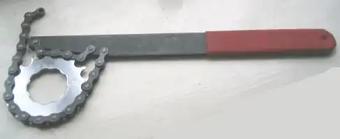 A chain whip tool, wrapped around a sprocket.