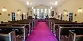 This Anglican chancel delineates the standard practice of the pulpit being located in the Gospel side and the lectern being located in the Epistle side.