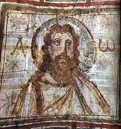 The Greek letters alpha and omega surround the halo of Jesus in the catacombs of Rome from the 4th century.
