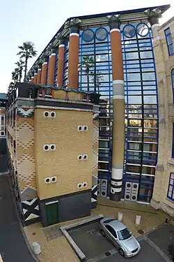 Postmodern Doric columns of the Judge Business School, University of Cambridge, England, by John Outram, 1995[34]