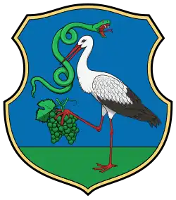 középre