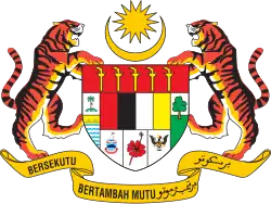 Shield showing the symbols of the Malaysian states with a star and crescent above and a motto below, supported by two tigers