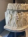 Detail of the semicircular marble base.