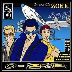 Cartoon illustration of, from left to right, Radu Sîrbu, Arsenie Todiraş, and Dan Bălan, with a flying airplane in the background. Radu is shown in gray with sunglasses, Arsenie is shown in blue with sunglasses, and Dan is shown in a yellow t-shirt. The caption on the bottom reads "O-Zone" while the caption on the top-right reads "DiscO-Zone."