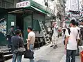 The closed and the still-operating dai pai dongs on the street in 2005