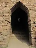 Corbelled arch doorway of Indo-Parthian Buddhist monastery at Takht-i-Bahi, Pakistan, c. 3rd century AD
