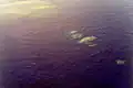 Rafts of volcanic rocks rising to the surface above the Minami-Hiyoshi volcano in 12 January 1977