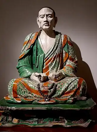 One of the Group of glazed pottery luohans from Yixian, c. 1000