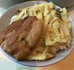 With fermented bamboo shoots