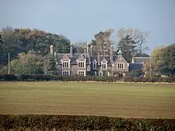 New crop emerging near Thorpe Constantine. The former Rectory beyond is believed to date from the 1820s