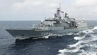 A view from USS Seattle, showing HS Psara underway conducting a replenishment at sea in 2002