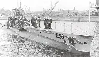 Submarine with crew on deck