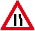 Road narrows on right side