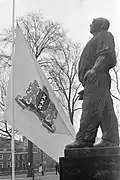 Commemoration February strike with flag at half-mast at the dockworker