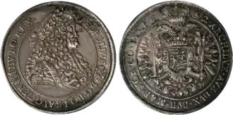 Hungarian Thaler of Leopold I minted in 1692. Latin inscription: Obverse, LEOPOLDVS D[EI] G[RATIA] RO[MANORVM] I[MPERATOR] S[EMPER] AVG[VSTVS] GER[MANIAE] HV[NGARIAE] BO[HEMIAE] REX; Reverse, ARCHIDVX AVS[TRIAE] DVX BVR[GVNDIAE] MAR[CHIO] MOR[AVIAE] CO[MES] TY[ROLIS] 1692, "Leopold, by the grace of God, Emperor of the Romans, Ever Augustus, King of Germany, Hungary, and Bohemia; Archduke of Austria, Duke of Burgundy, Margrave of Moravia, Count of Tyrol 1692"