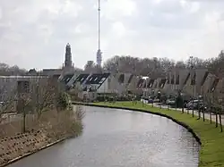 Hollandse IJssel through IJsselstein with church and Gerbrandy Tower in background
