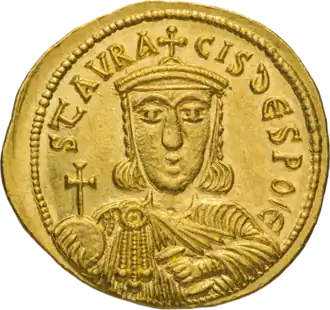 An image of a golden coin bearing the front-facing image of Staurakios, who is adorned with imperial regalia
