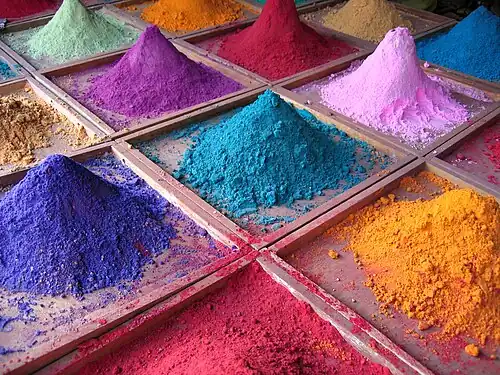 Image 15 Pigment Photo credit: Dan Brady Pigments for sale at a market stall in Goa, India. Many pigments used in manufacturing and the visual arts are dry colourants, ground into a fine powder. This powder is then added to a vehicle or matrix, a relatively neutral or colorless material that acts as a binder, before it is applied. Unlike a dye, a pigment generally is insoluble. More selected pictures