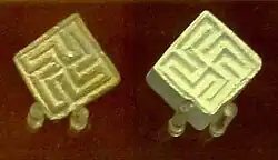 Swastika seals from Mohenjo-daro, Pakistan, of the Indus Valley civilisation, circa 2,100–1,750 BCE, preserved at the British Museum[90]