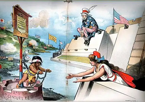 Image 7Rebel leaders engaged in extensive propaganda to get the U.S. to intervene, as shown in this cartoon in an American magazine. Columbia (the American people) reaches out to help oppressed Cuba in 1897 while Uncle Sam (the U.S. government) is blind to the crisis and will not use its powerful guns to help. Judge magazine, 6 February 1897. (from History of Cuba)